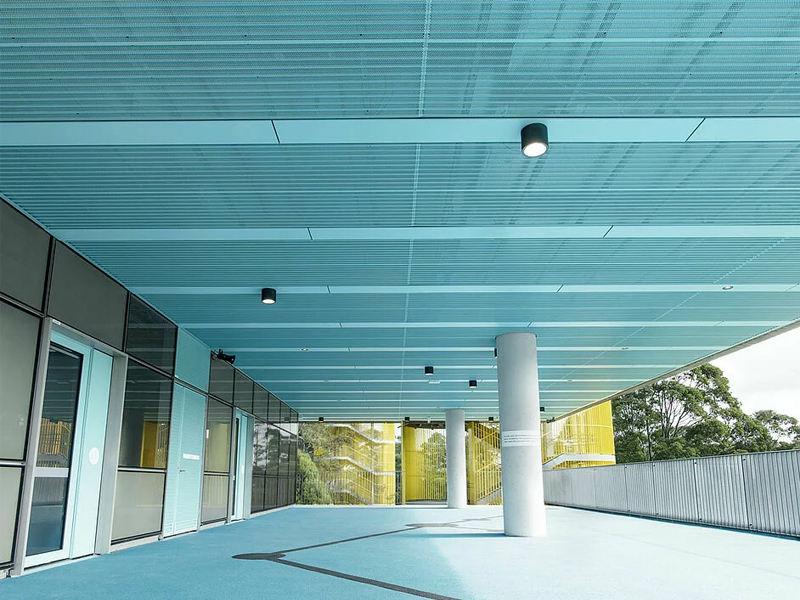 Colorful Transformation: Jayminton's Meadowbank Education Precinct with Customized Ceiling Panels