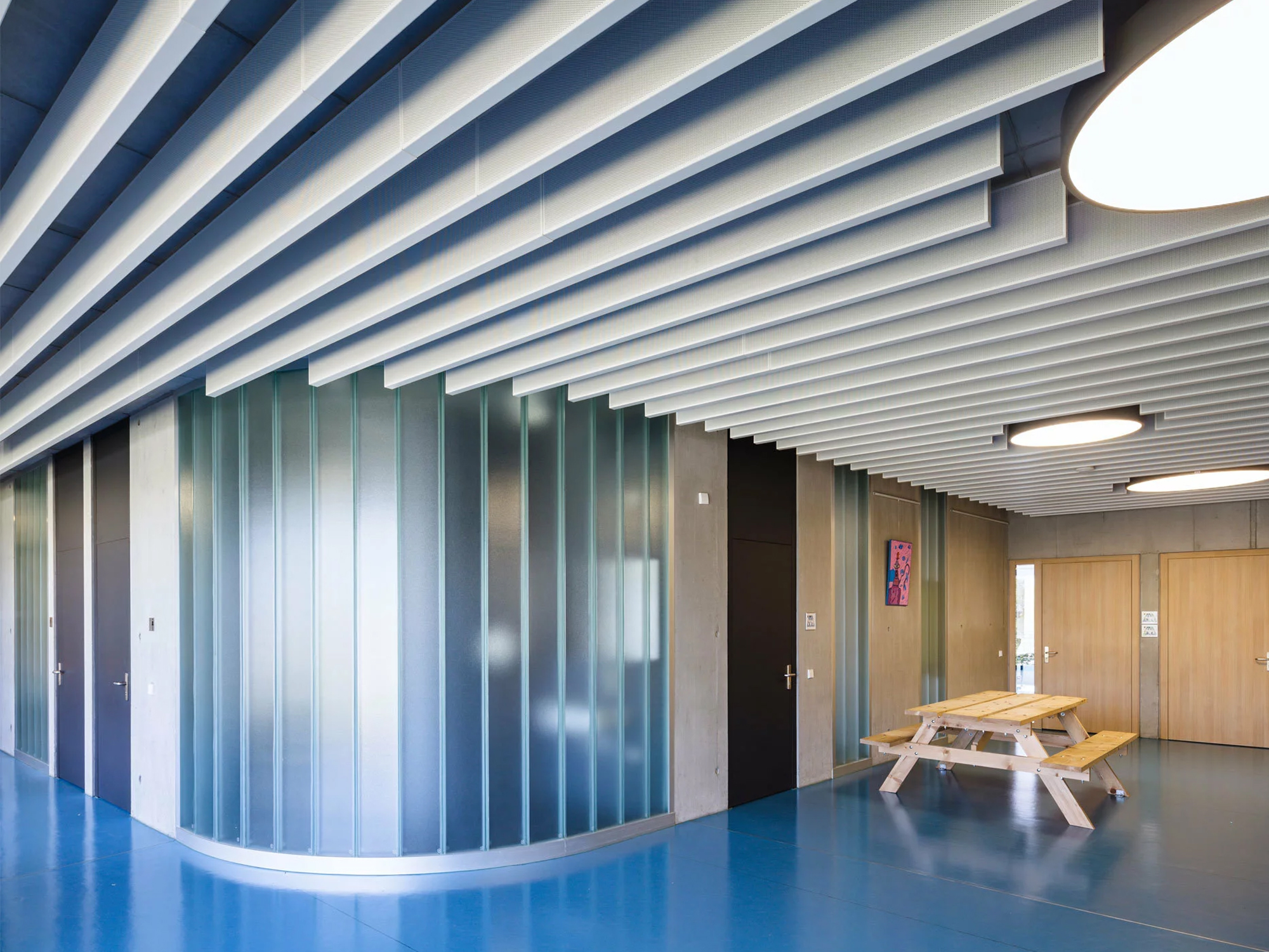 Integrating Aesthetics and Acoustics: Metal Baffle Ceiling Solutions for Contemporary Spaces.jpg