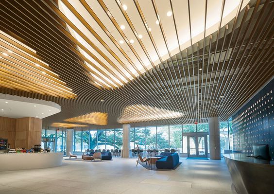 Harmonizing Aesthetics and Acoustics: Custom Modern Aesthetics and Acoustic Harmony: Aluminum Baffle Ceiling Solutions.jpg